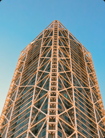 A modern building with a wooden truss structure